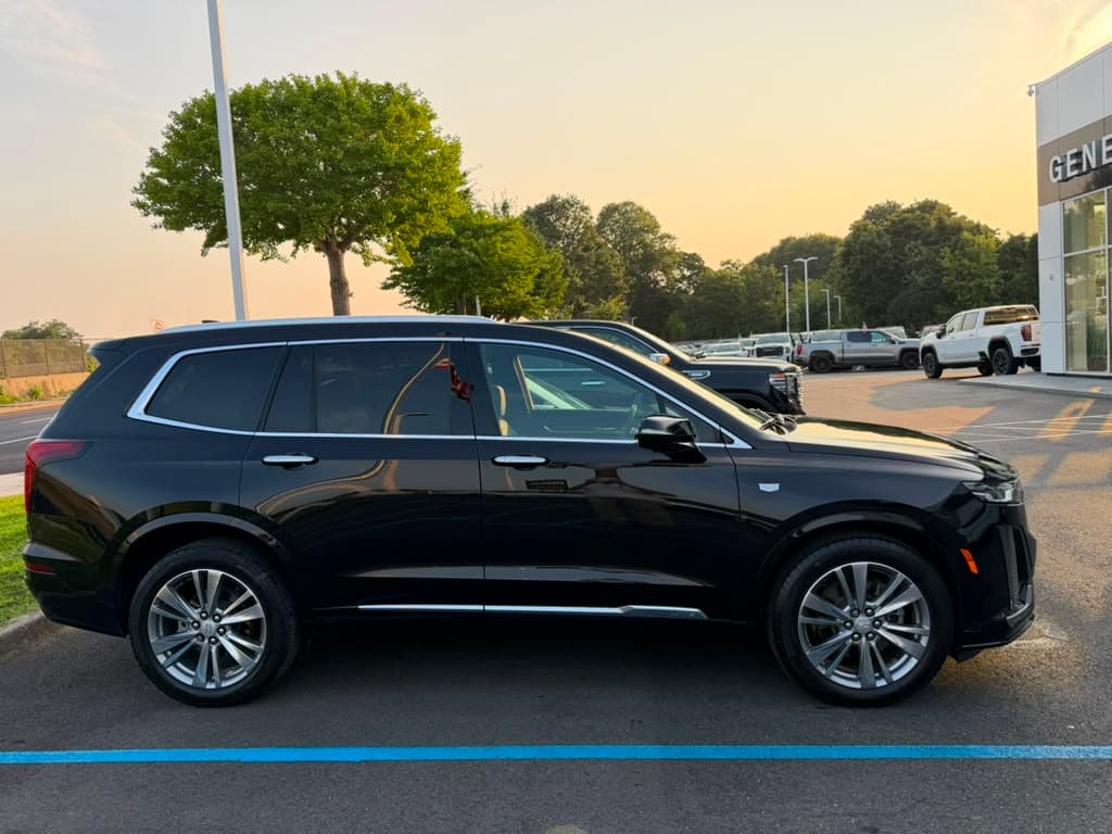 Cadillac XT6 mid-size luxury black SUV chauffeured on Long Island